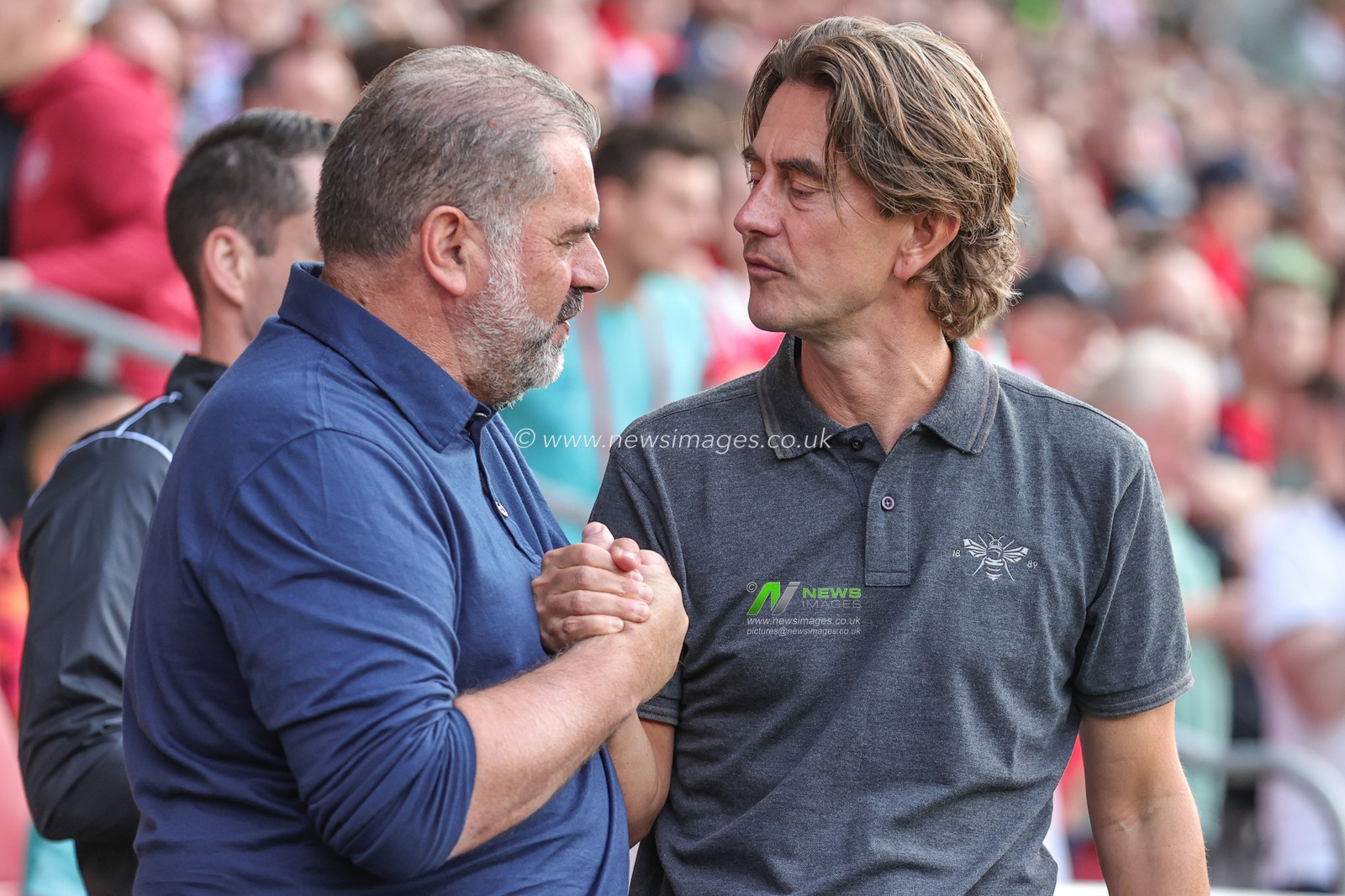 head coach of Tottenham Hotspur and Thomas Frankhead coach of Brentford shake hands during the Premier League match Brentford vs Tottenham Hotspur at Brentford Community Stadium, London, United Kingdom, 13th August 2023

(Photo by Mark Cosgrove/News Images)