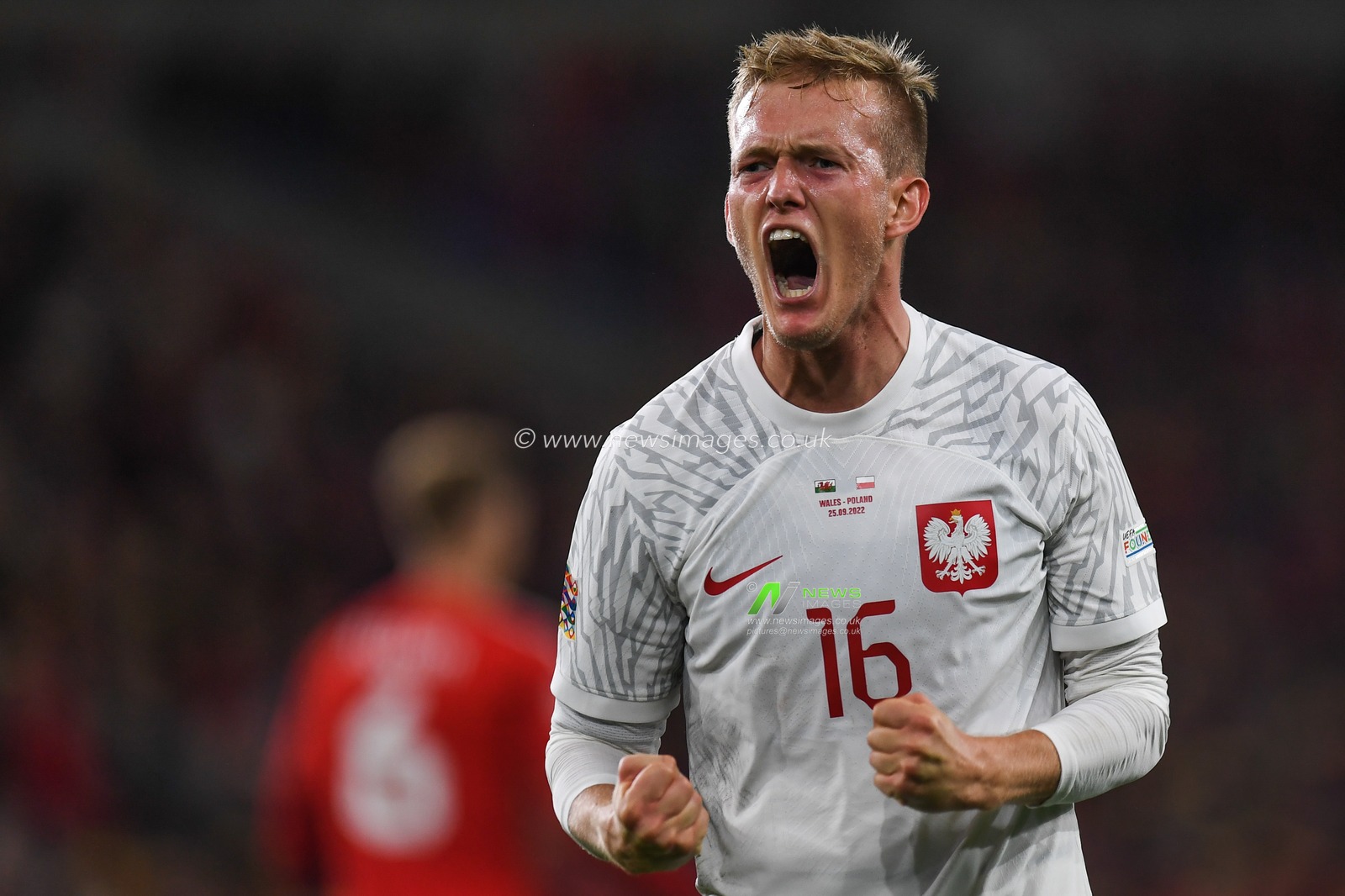 Karol Swiderski of Poland scores and celebrates his goal during the UEFA Nations League Group A4 match between Wales vs Poland at Cardiff City Stadium, Cardiff, United Kingdom, 25th September 2022

(Photo by Mike Jones/News Images)