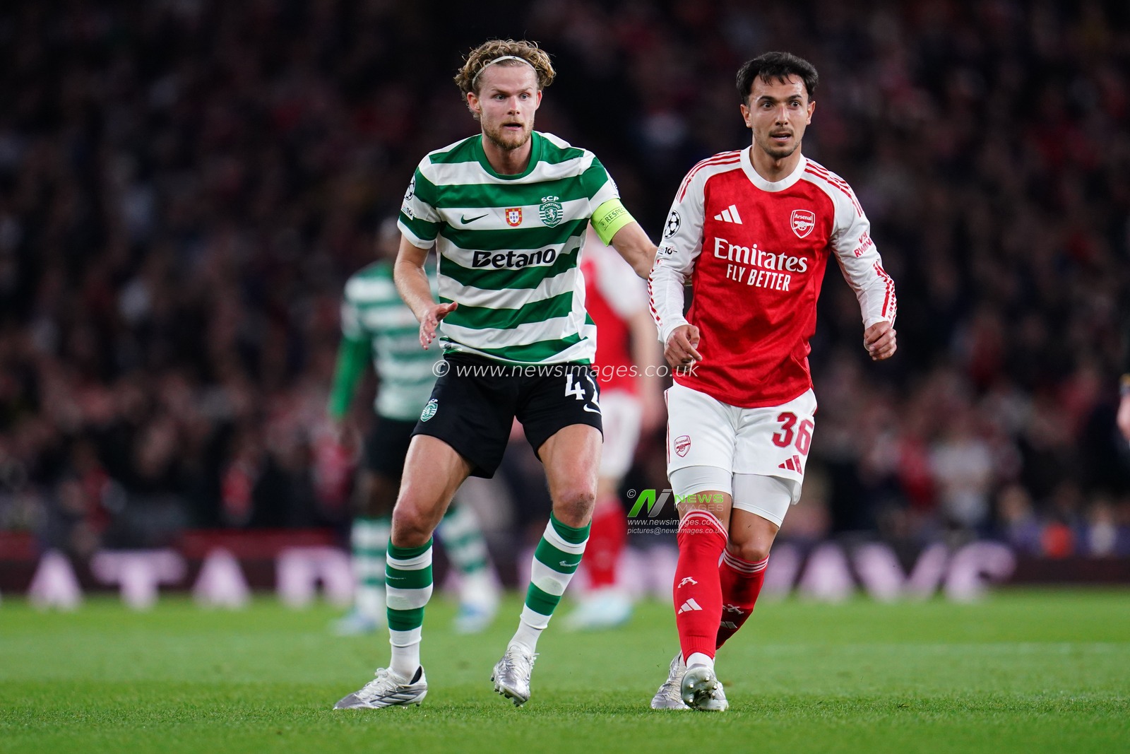 Martin Zubimendi of Arsenal and Morten Hjulmand of Sporting CP during the UEFA Champions League Quarter Finals match Arsenal vs Sporting CP at Arsenal stadium, London, United Kingdom on 15 April 2026

(Photo by Harvey Murphy/News Images)