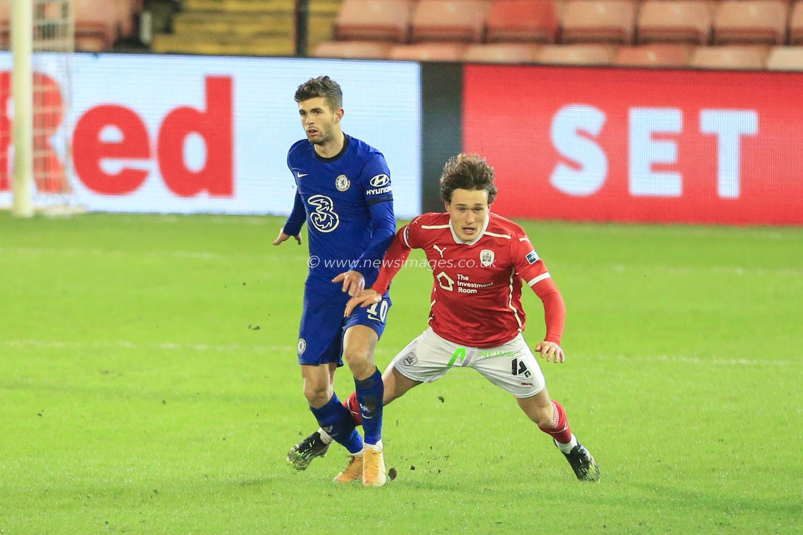 Callum Styles #4 of Barnsley and Christian Pulisic #10 of Chelsea clash, no foul