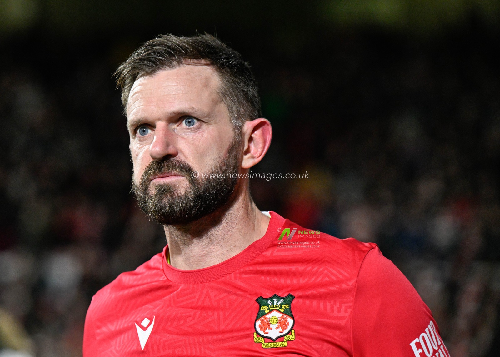 Mark Howard of Wrexham walks towards the bench ahead of kick off, during the Sky Bet League 2 match Wrexham vs Harrogate Town at SToK Cae Ras, Wrexham, United Kingdom, 12th March 2024

(Photo by Cody Froggatt/News Images)