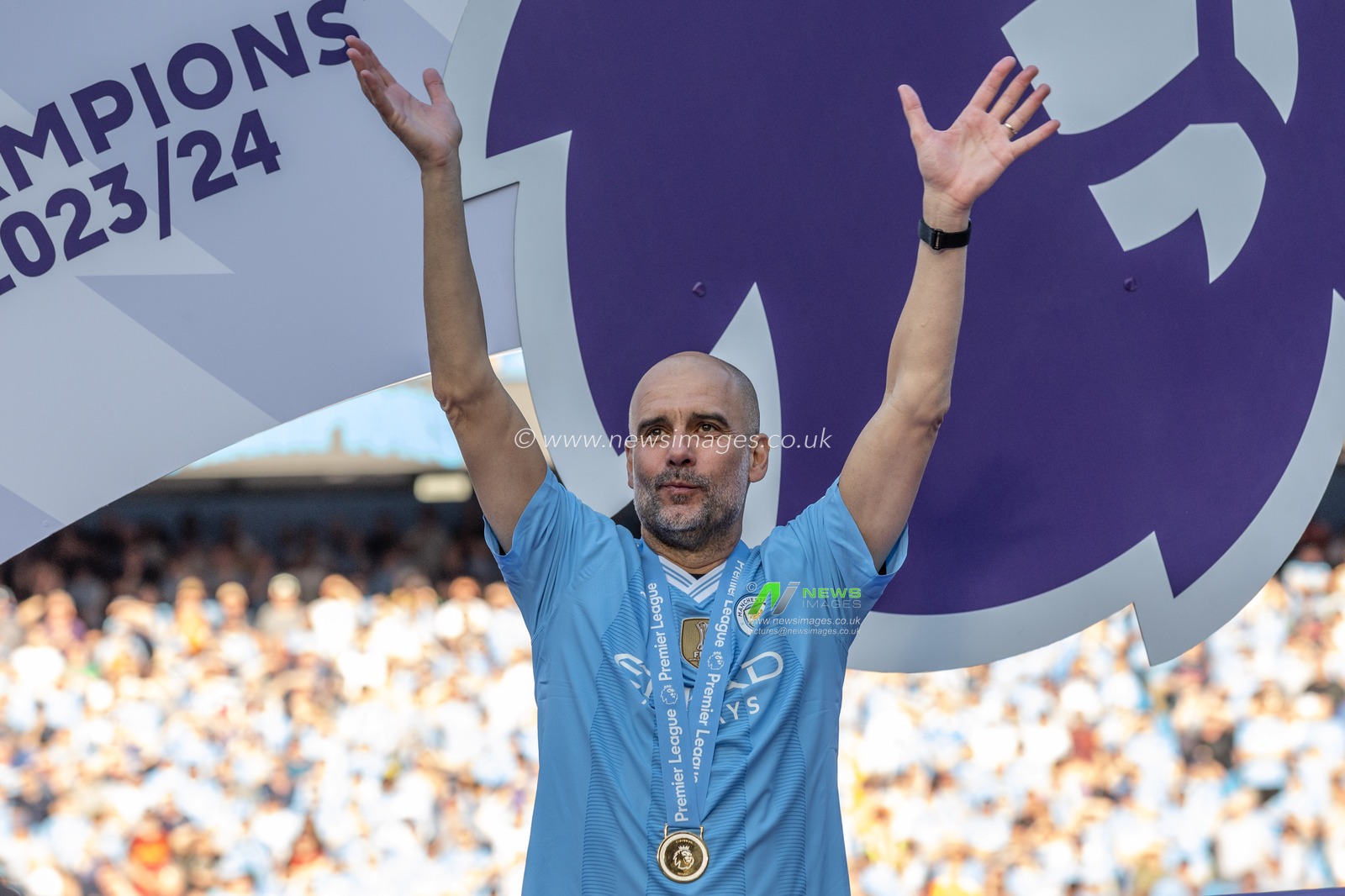 Pep Guardiola manager of Manchester City celebrates winning the league uring the Premier League match Manchester City vs West Ham United at Etihad Stadium, Manchester, United Kingdom, 19th May 2024

(Photo by Mark Cosgrove/News Images)