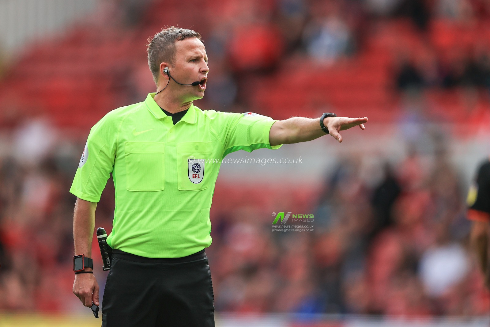 Referee David Webb makes a call