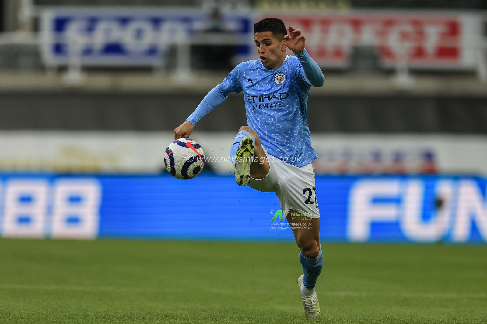 JoÃ£o Cancelo #27 of Manchester City in possession of the ball