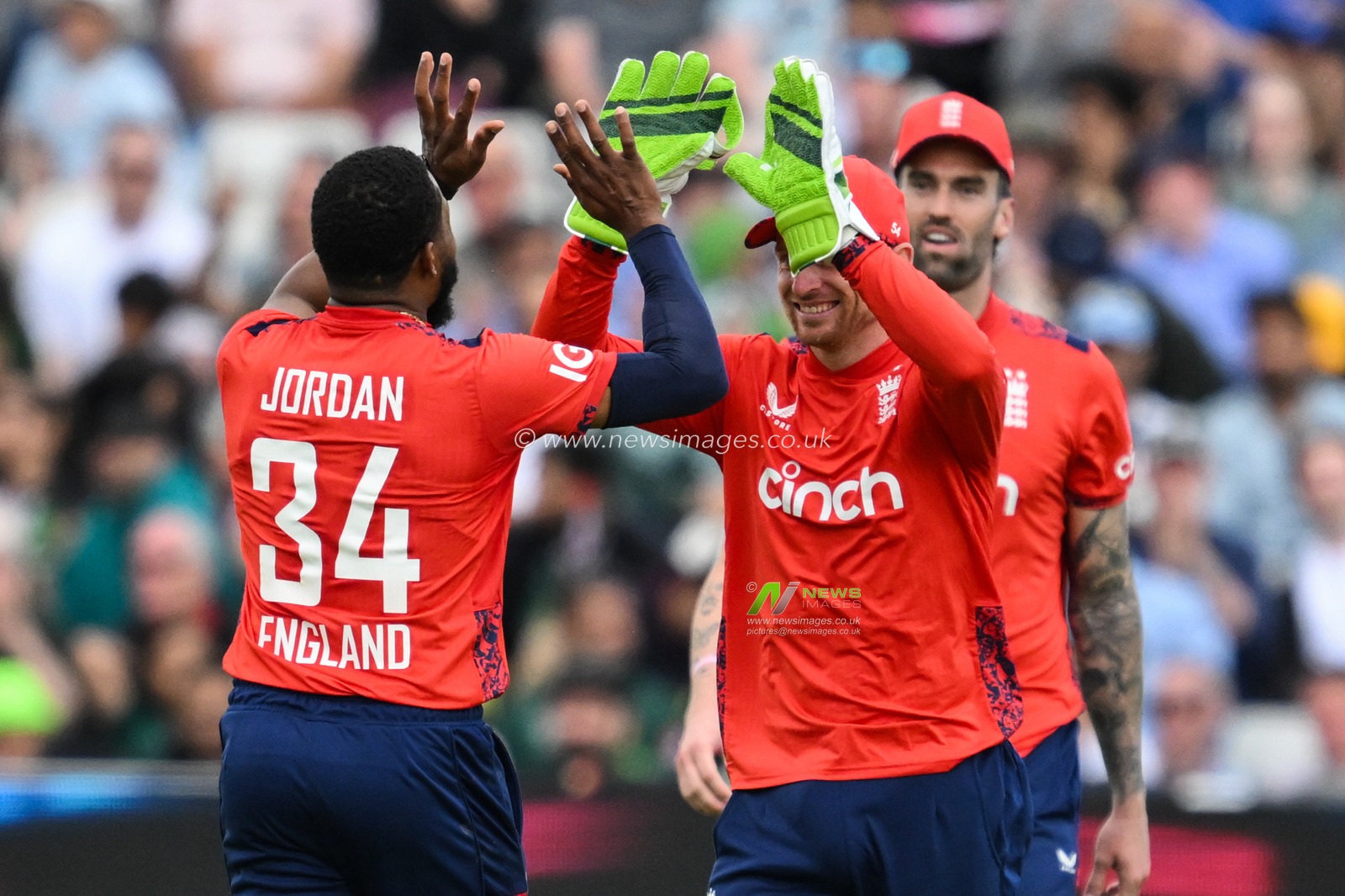 Chris Jordan of England and Jos Buttler of England celebrates the dismissal of Mohammad Amir of Pakistan during the Vitality T20 International Series match England vs Pakistan at Edgbaston, Birmingham, United Kingdom, 25th May 2024

(Photo by Craig Thomas/News Images)