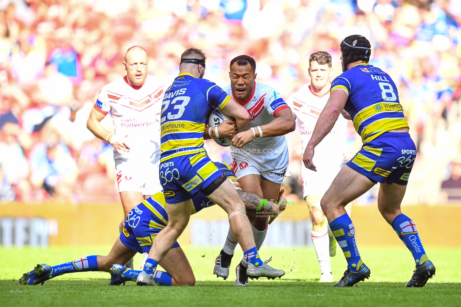 24th August 2019 , Wembley Stadium, London England ; 2019 Coral Challenge Cup Final ; St Helens vs Warrington Wolves ; Joseph Paulo (12) of St Helens is tackled by Matt Davis of Warrington Wolves 



Credit: Craig Thomas/News Images