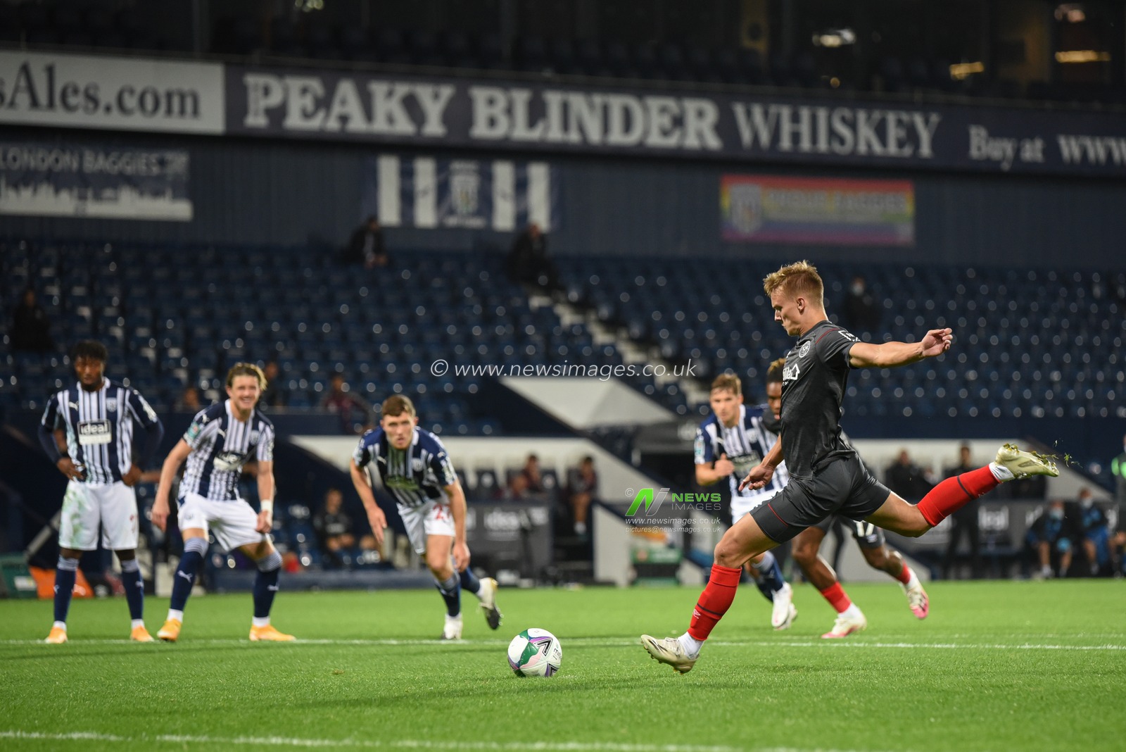 Marcus Forss (15) of Brentford scores a penalty to make it 2-2