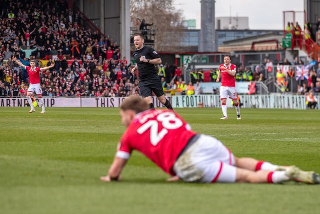 Referee Simon Mather ignores Wrexhamâ€™s appeals for a penalty during the Sky Bet League 1 match Wrexham vs Stockport County at SToK Cae Ras, Wrexham, United Kingdom, 22nd March 2025

(Photo by Nik Mesney/News Images)