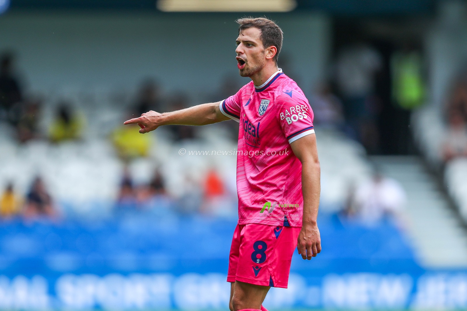 Jayson Molumby of West Bromwich Albion gives the team instructions during the Sky Bet Championship match Queens Park Rangers vs West Bromwich Albion at Kiyan Prince Foundation Stadium, London, United Kingdom, 10th August 2024

(Photo by Izzy Poles/News Images)