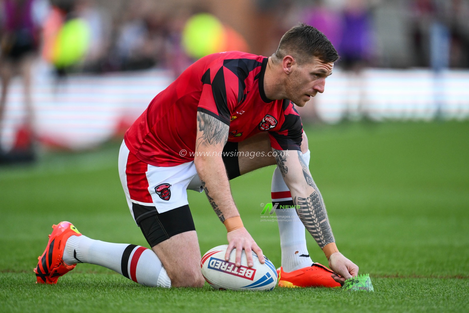 Marc Sneyd of Salford Red Devils prepares to kick at goal during pre match warm up ahead of the Betfred Super League Round 11 match Leigh Leopards vs Salford Red Devils at Leigh Sports Village, Leigh, United Kingdom, 10th May 2024

(Photo by Craig Thomas/News Images)