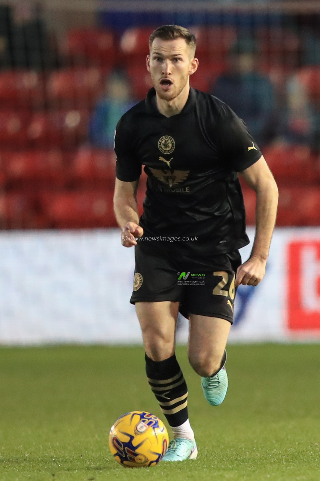 Jamie McCart #26 of Barnsley during the Sky Bet League 1 match Lincoln City vs Barnsley at Gelder Group Sincil Bank Stadium, Lincoln, United Kingdom, 25th November 2023

(Photo by Alfie Cosgrove/News Images)