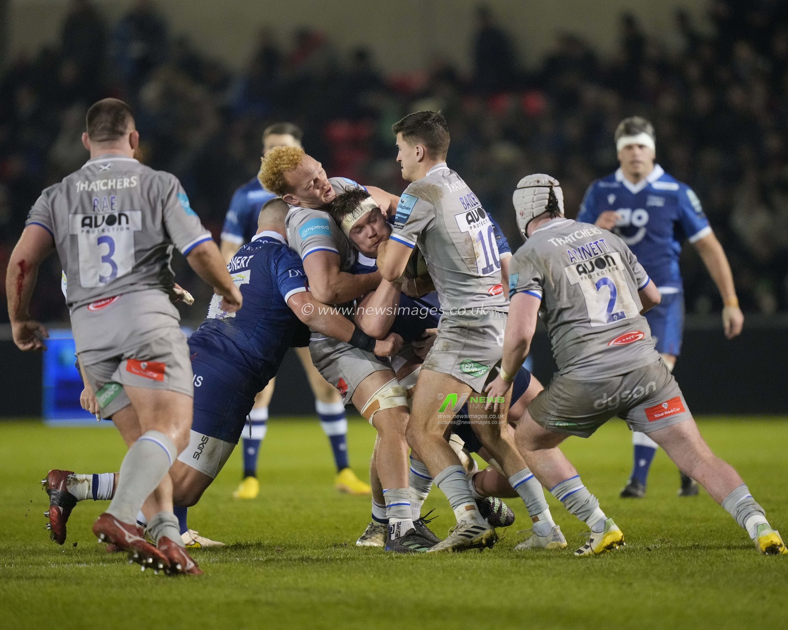 Cobus Wiese #4 of Sale Sharks is held by Miles Reid #8 and Orlando Bailey #10 of Bath Rugby during the Gallagher Premiership match Sale Sharks vs Bath Rugby at AJ Bell Stadium, Eccles, United Kingdom, 27th January 2023

(Photo by Steve Flynn/News Images)