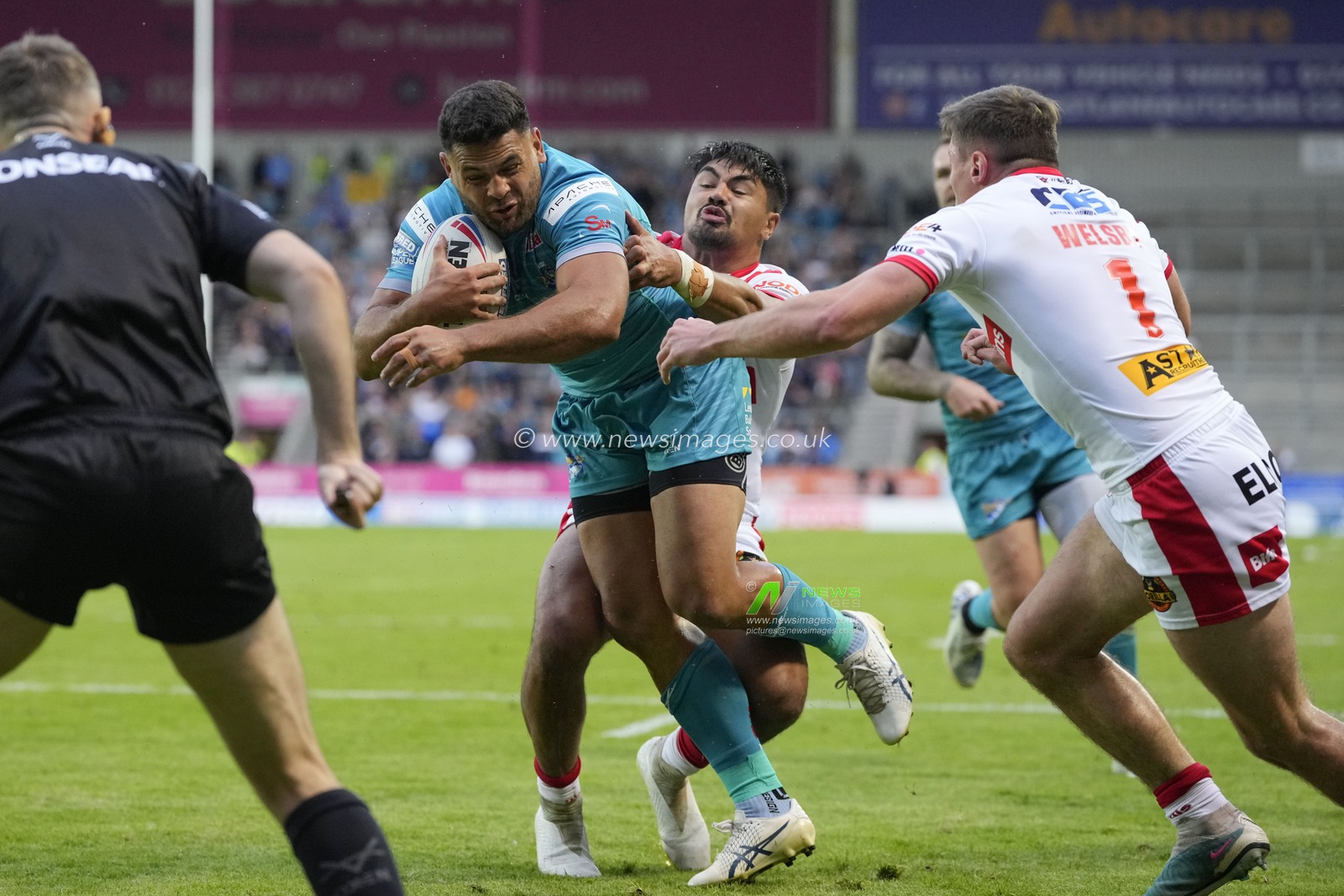 Rhyse Martin #12 of Leeds Rhinos breaks past James Bell #19 of St. Helens to score a try during the Betfred Super League Round 20 match St Helens vs Leeds Rhinos at Totally Wicked Stadium, St Helens, United Kingdom, 28th July 2023

(Photo by Steve Flynn/News Images)