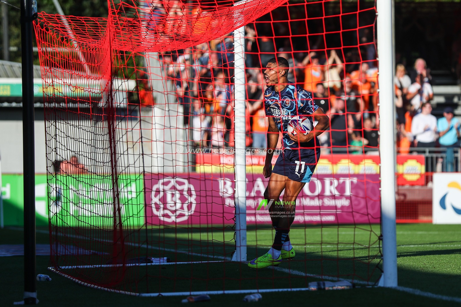 Ashley Fletcher of Blackpool gees up the travelling fans after scoring to make it 2-1 during the Sky Bet League 1 match Crawley Town vs Blackpool at Broadfield Stadium, Crawley, United Kingdom, 10th August 2024

(Photo by Gareth Evans/News Images)