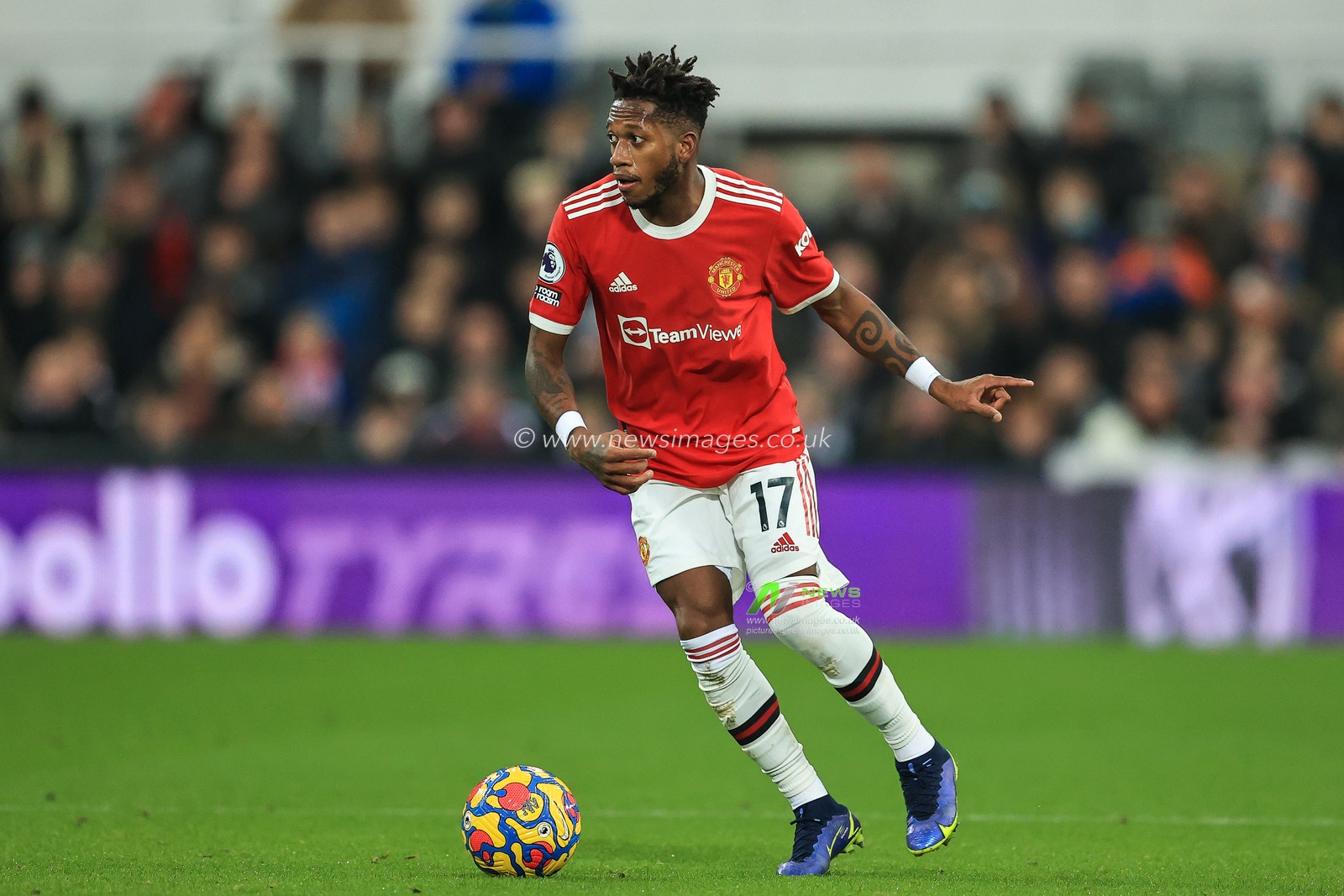 Fred #17 of Manchester United makes a break with the ball