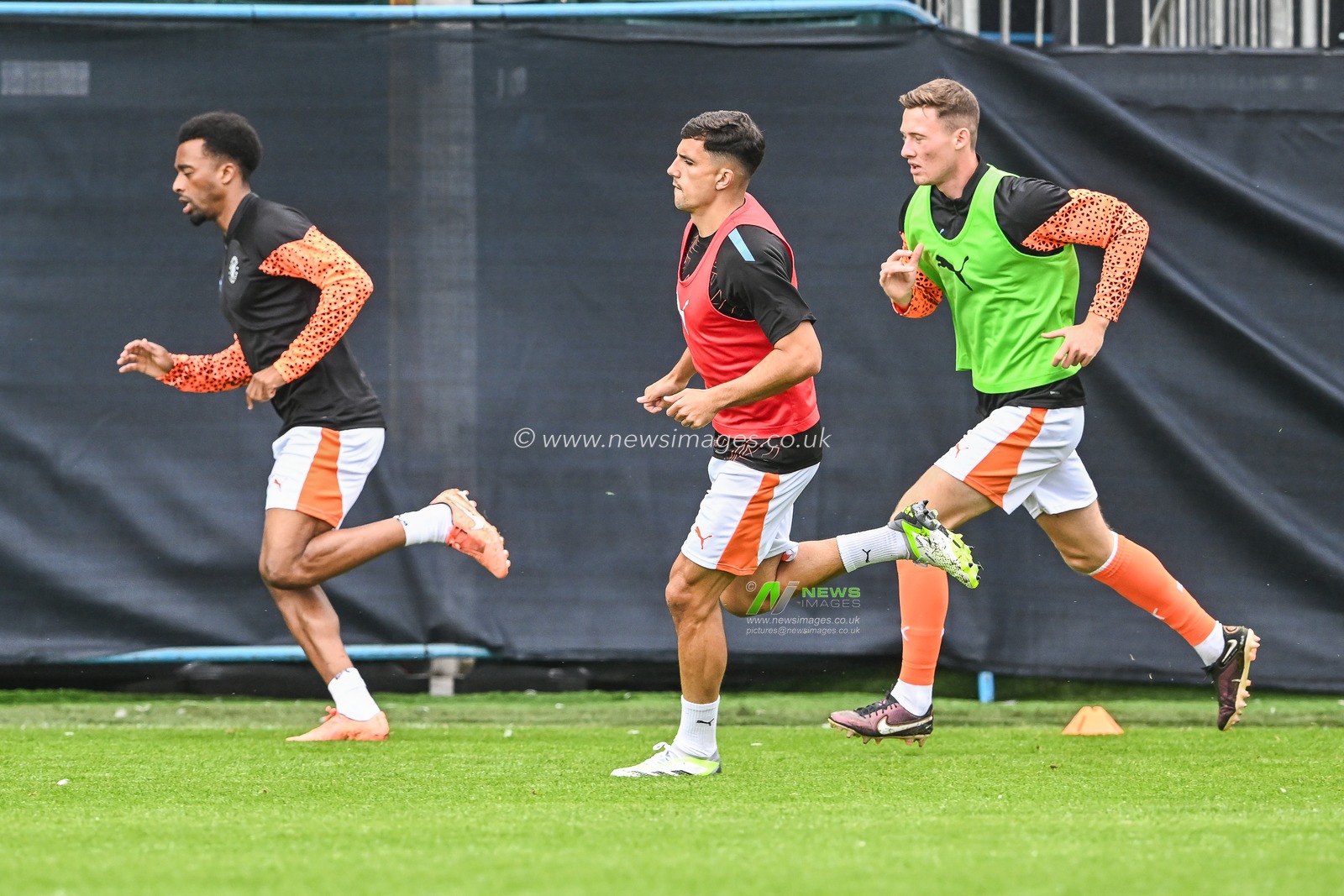 Blackpool players during the pre-game warmup ahead of the Pre-season friendly match Barrow vs Blackpool at SO Legal Stadium, Barrow-in-Furness, United Kingdom, 22nd July 2023

(Photo by Craig Thomas/News Images)