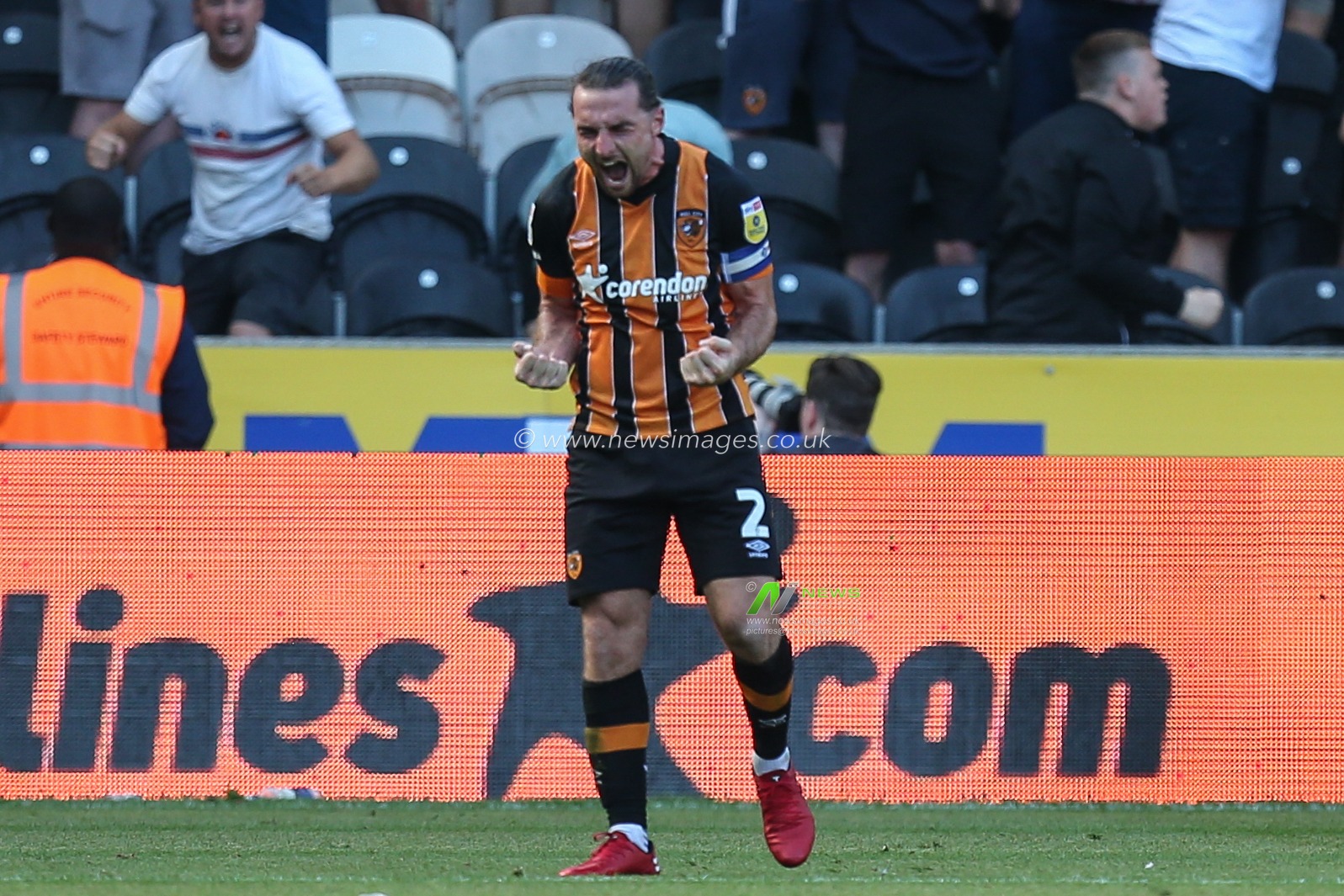 Lewie Coyle #2 of Hull City shows his happiness at the final whistle
