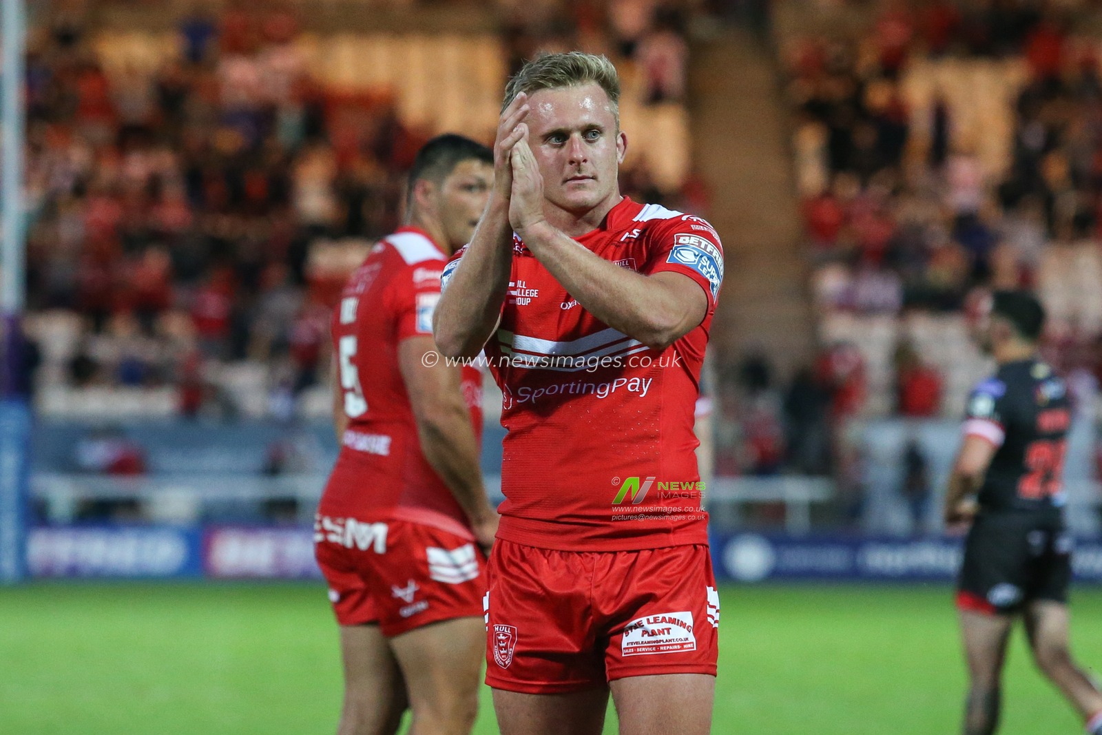Jez Litten (14) of Hull KR applauds the fans in the South Stand