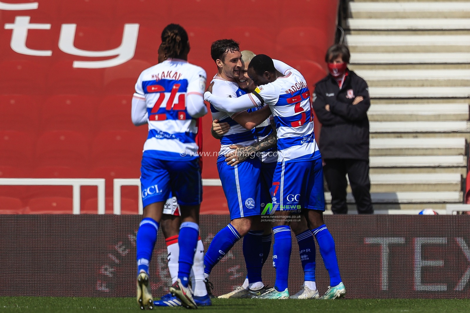 Lee Wallace #3 of Queens Park Rangers celebrates his goal with his teammates to make it 0-2