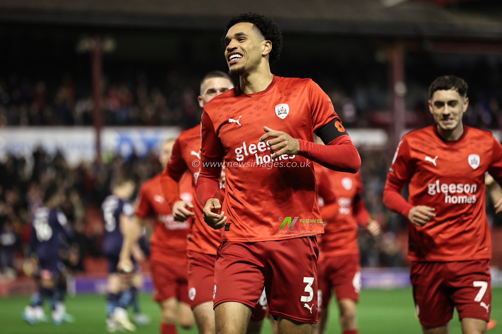 Jon Russell of Barnsley celebrates his goal to make it 1-0 during the Sky Bet League 1 match Barnsley vs Rotherham United at Oakwell, Barnsley, United Kingdom, 8th November 2024

(Photo by Alfie Cosgrove/News Images)