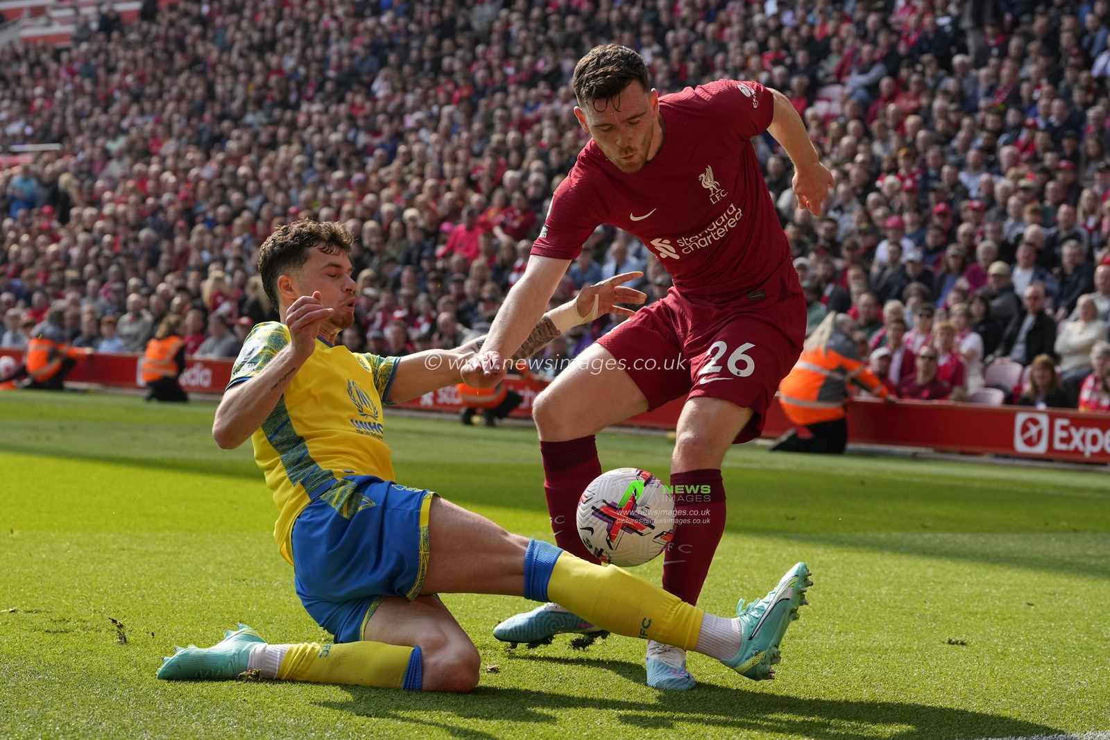 Neco Williams #7 of Nottingham Forest slides in to tackle Andrew Robertson #26 of Liverpool during the Premier League match Liverpool vs Nottingham Forest at Anfield, Liverpool, United Kingdom, 22nd April 2023

(Photo by Steve Flynn/News Images)