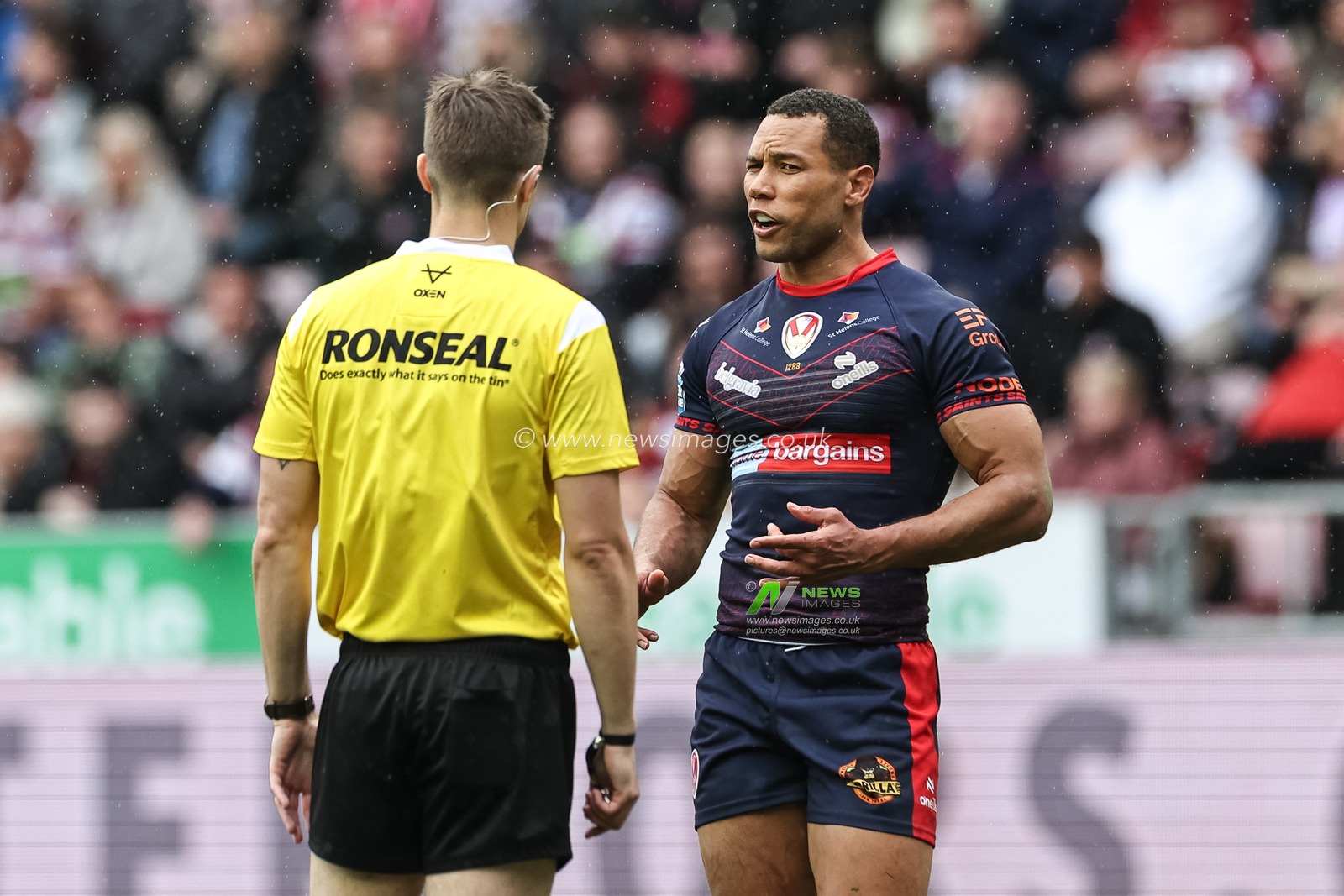 Referee Chris Kendall speaks to Moses Mbye of St. Helens before giving him a yellow card during the Betfred Super League Round 8 match Wigan Warriors vs St Helens at The Brick Community Stadium, Wigan, United Kingdom, 18th April 2025

(Photo by Mark Cosgrove/News Images)
