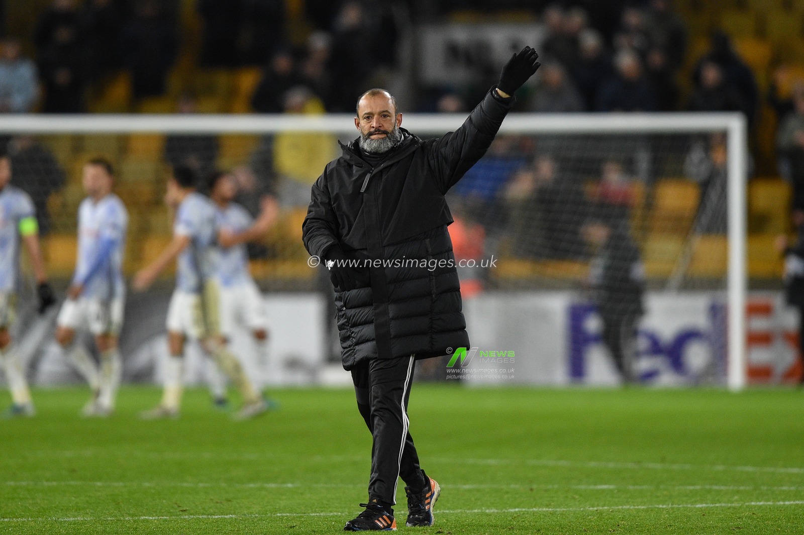 12th December 2019, Molineux, Wolverhampton, England; UEFA Europa League, Wolverhampton Wanderers v Besiktas : Nuno EspÃ­rito Santo manager of Wolverhampton Wanderers wakes to the fans as Wolves win 4-0 

Credit: Richard Long/News Images