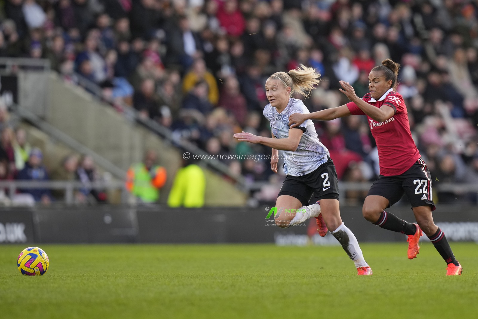 Nikita Parris #22 of Manchester United competes for the ball with Emma Koivisto #2 of Liverpool Women during the The Fa Women's Super League match Manchester United Women vs Liverpool Women at Leigh Sports Village, Leigh, United Kingdom, 15th January 2023

(Photo by Steve Flynn/News Images)
