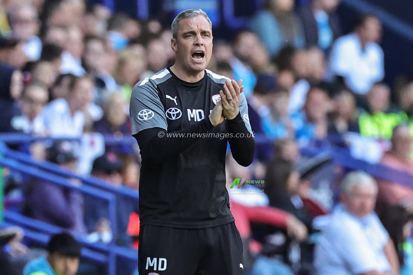 Michael Duff manager of Barnsley applauds his players during the Sky Bet League 1 Play-Off match Bolton Wanderers vs Barnsley at University of Bolton Stadium, Bolton, United Kingdom, 13th May 2023

(Photo by Mark Cosgrove/News Images)