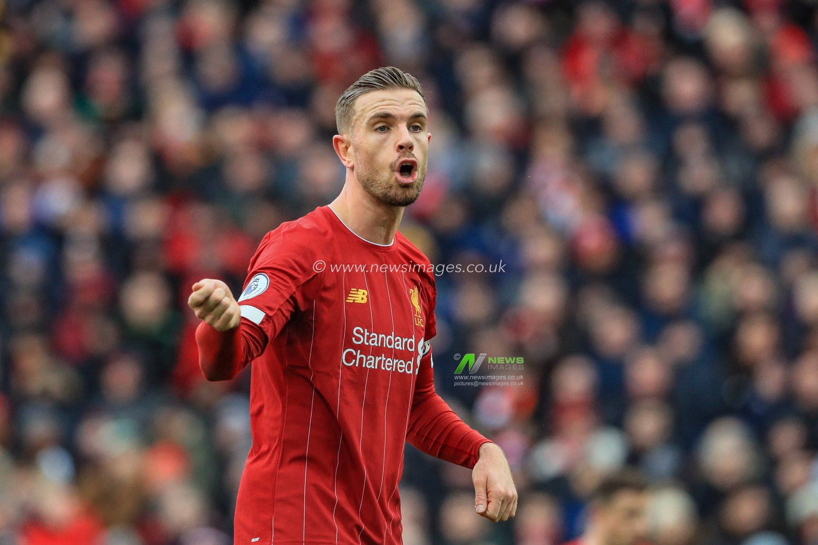 14th December 2019, Anfield, Liverpool, England; Premier League, Liverpool v Watford :  Jordan Henderson (14) of Liverpool gives instruction s to Roberto Firmino (9) of Liverpool during a Watford corner 

Credit: Mark Cosgrove/News Images