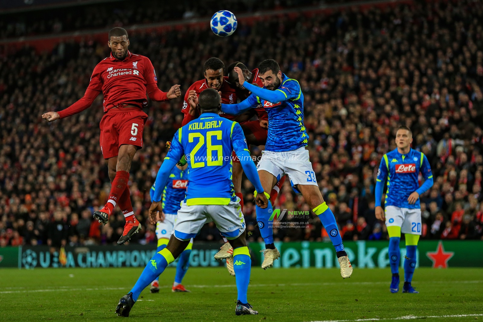 11th December 2018, Anfield, Liverpool, England; UEFA Champions League, Liverpool v Napoli ; Georginio Wijnaldum (05) of Liverpool heads on goal


  Credit: Mark Cosgrove/News Images
