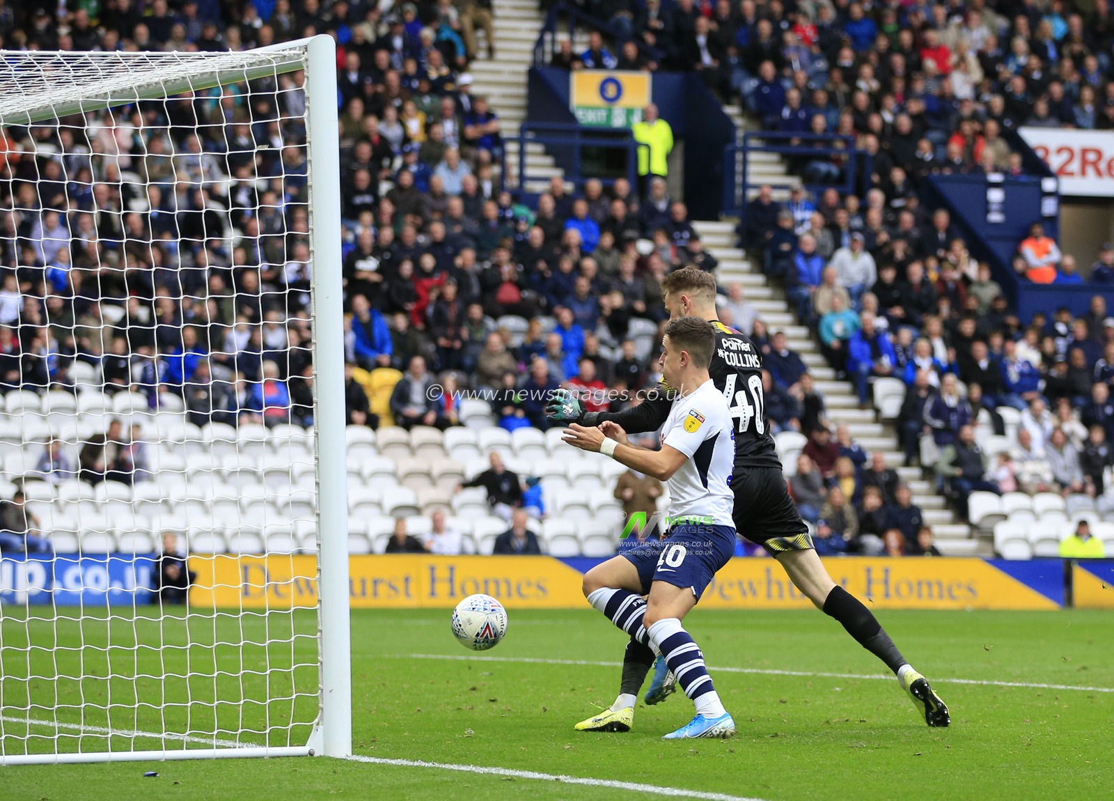 5th October 2019, Deepdale, Preston, England; Sky Bet Championship, Preston North End v Barnsley : Josh Harrop (10) of Preston North End rounds the goalkeeper Bradley Collins (40) of Barnsley in the 77th minute to make it 5-1 to Preston

Credit: Conor Molloy/News Images