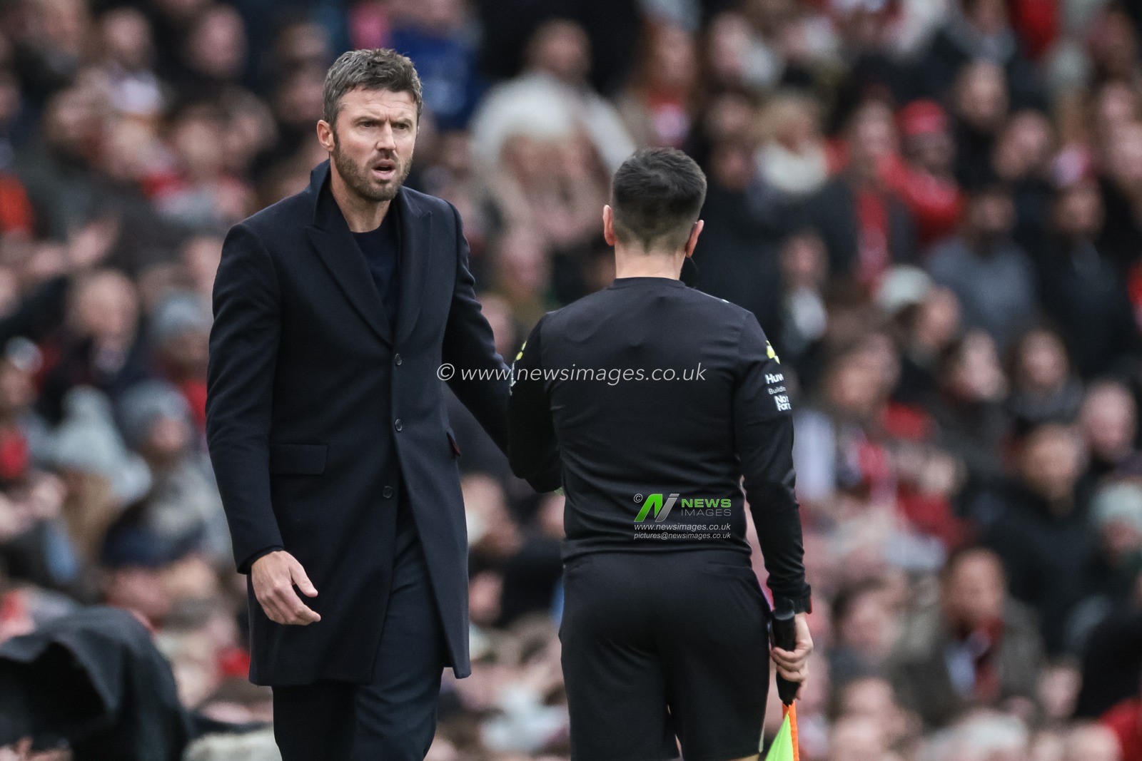 Michael Carrick interim head coach of Manchester United reacts with the line official during the Premier League match Manchester United vs Manchester City at Old Trafford, Manchester, United Kingdom, 17th January 2026

(Photo by Mark Cosgrove/News Images)