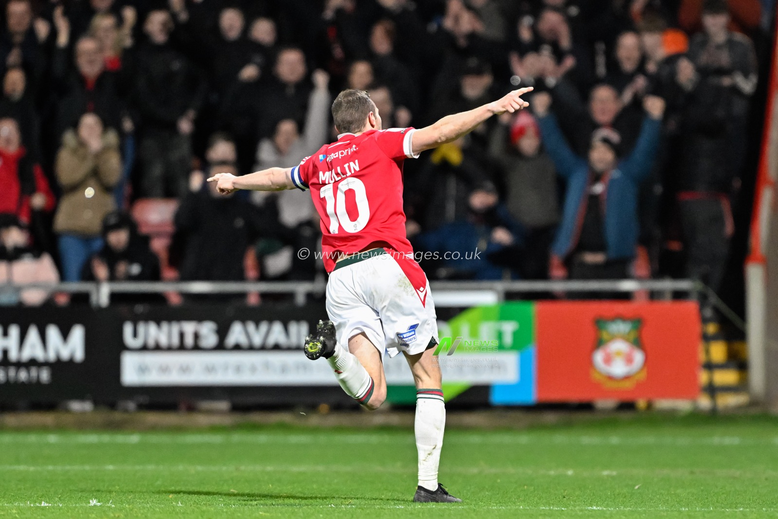 Paul Mullin of Wrexham celebrates his goal to make it 4-0 Wrexham, during the Sky Bet League 2 match Wrexham vs Crawley Town at SToK Cae Ras, Wrexham, United Kingdom, 9th April 2024

(Photo by Cody Froggatt/News Images)