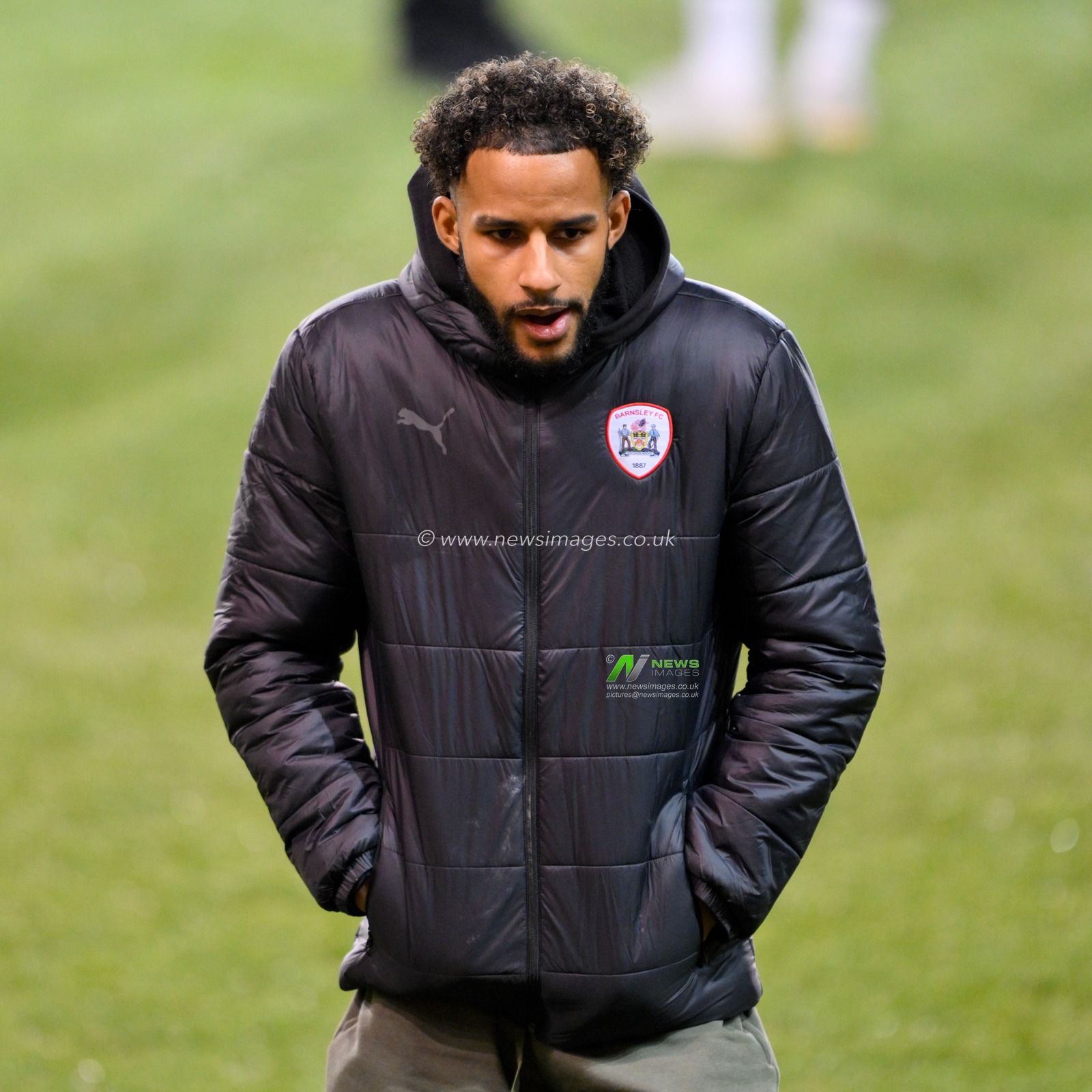 Barry Cotter #17 of Barnsley inspects the pitch ahead of the match, during the Bristol Street Motors Trophy match Blackpool vs Barnsley at Bloomfield Road, Blackpool, United Kingdom, 5th December 2023

(Photo by Cody Froggatt/News Images)