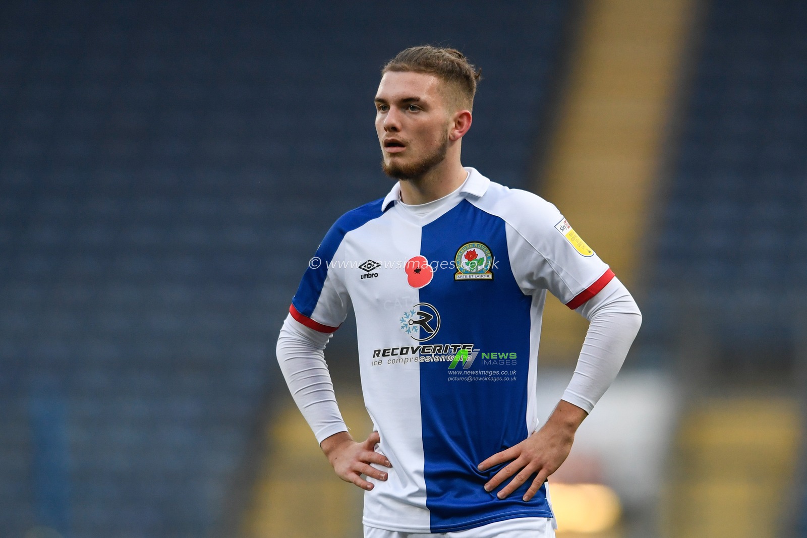 Harvey Elliott #16 of Blackburn Rovers with his hands on his hips