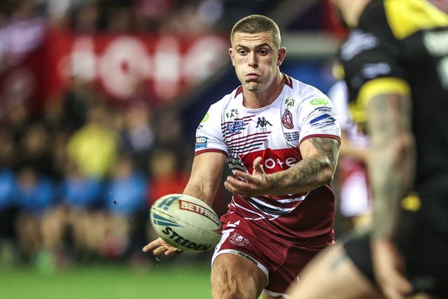 Brad O'Neill of Wigan Warriors passes the ball during the Betfred Super League round 5 match Wigan Warriors vs York Knights at The Brick Community Stadium, Wigan, United Kingdom on 19 March 2026

(Photo by Alfie Cosgrove/News Images)
