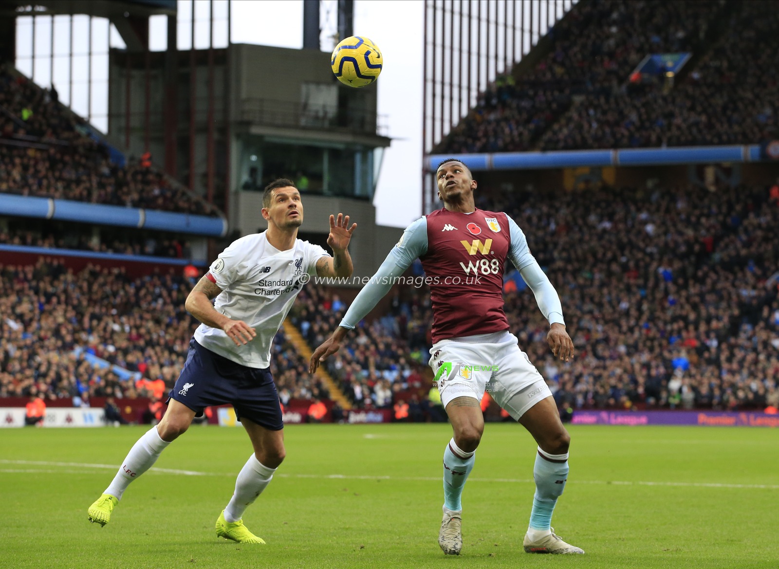 2nd November 2019, Villa Park, Birmingham, England; Premier League, Aston Villa v Liverpool : Wesley (9) of Aston Villa and Dejan Lovren (6) of Liverpool challenge for the ball

Credit: Conor Molloy/News Images