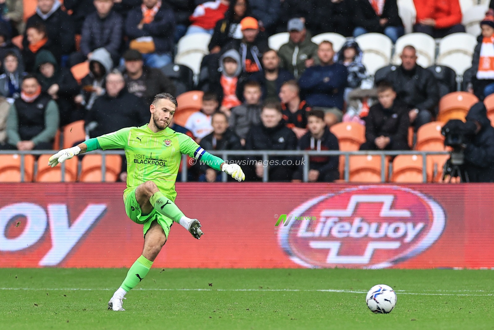 Chris Maxwell #1 of Blackpool kicks the ball out