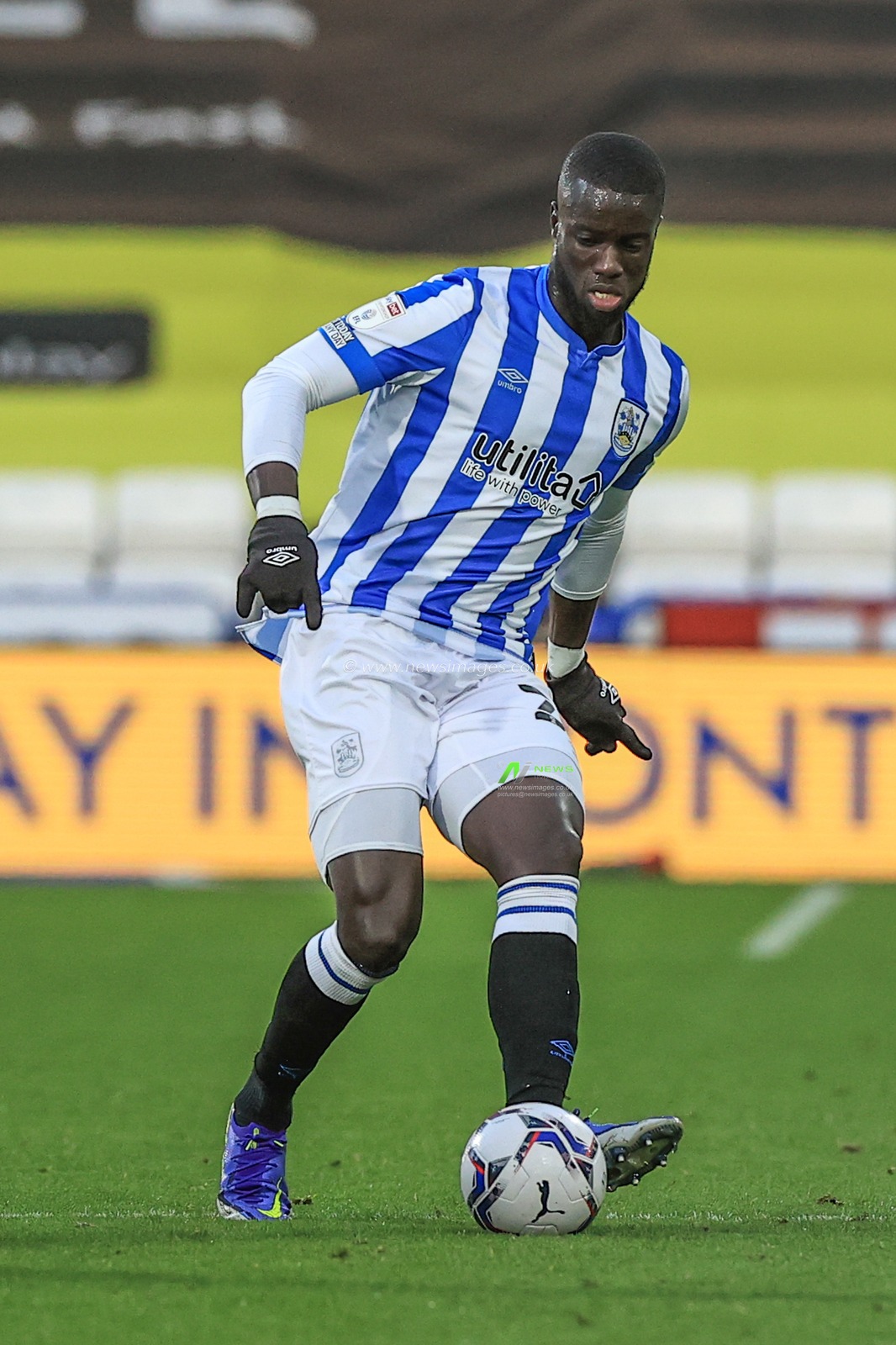 Naby Sarr #23 of Huddersfield Town in action during the game