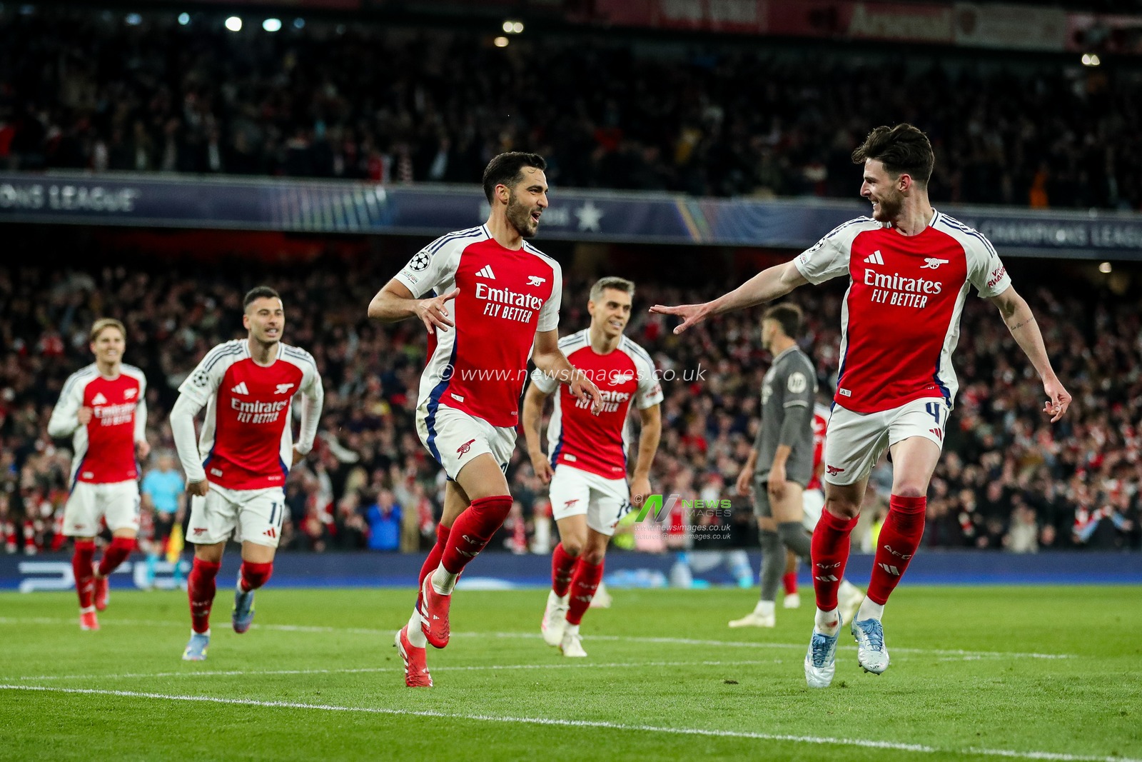 Mikel Merino of Arsenal celebrates his goal with Declan Rice to make it 3-0 during the UEFA Champions League Quarter-finals match Arsenal vs Real Madrid at Emirates Stadium, London, United Kingdom, 8th April 2025

(Photo by Izzy Poles/News Images)