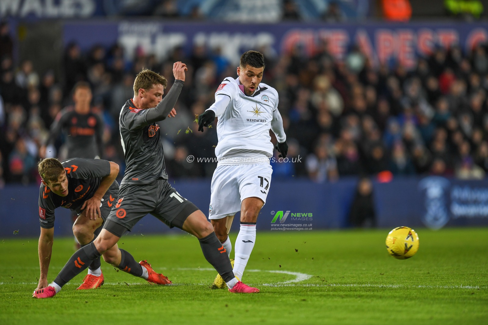 JoÃ«l Piroe #17 of Swansea City tackled by George Tanner #19 of Bristol City during the Emirates FA Cup Third Round Replay match Swansea City vs Bristol City at Swansea.com Stadium, Swansea, United Kingdom, 17th January 2023

(Photo by Mike Jones/News Images)