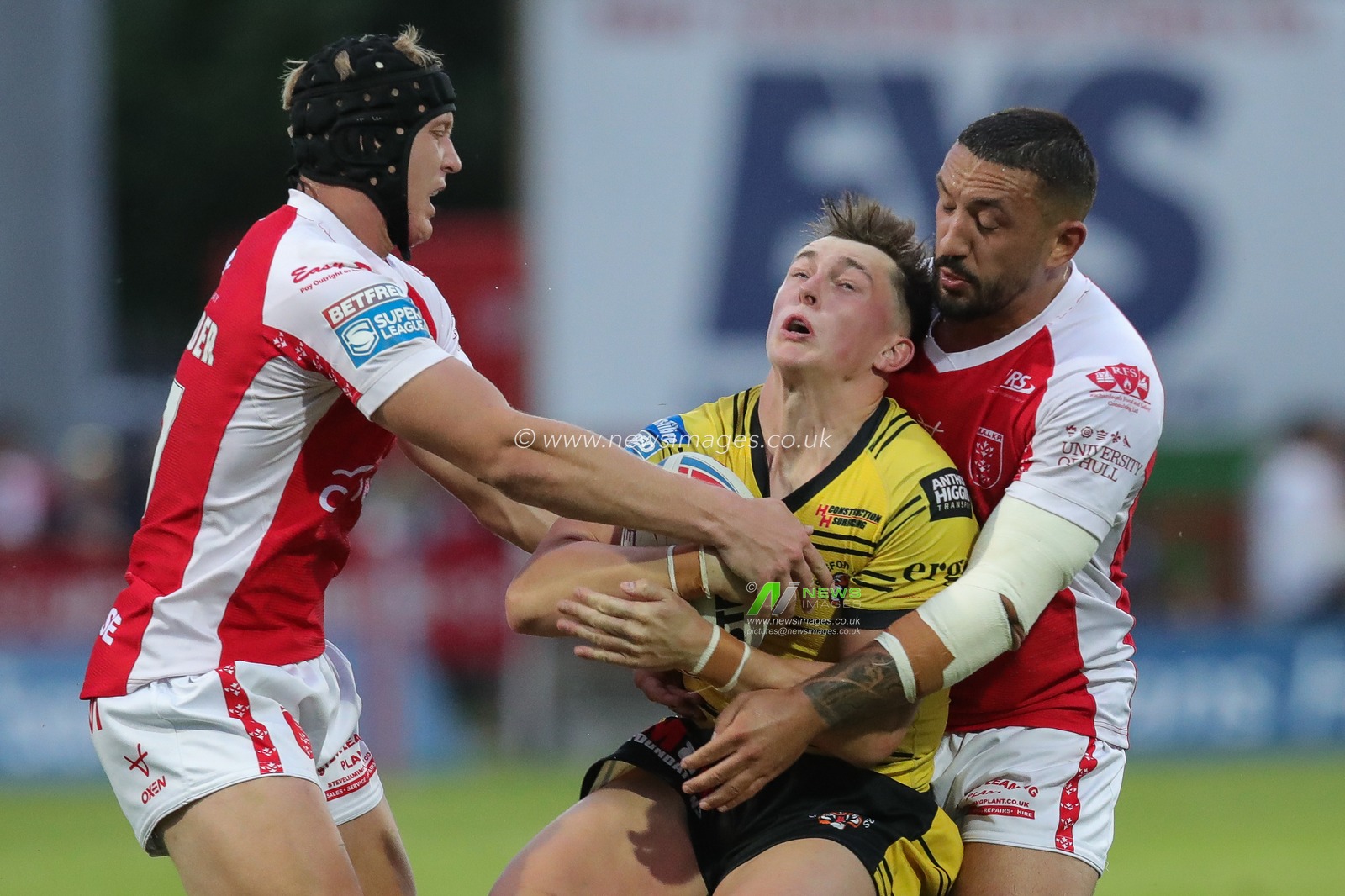 Jack Broadbent #17 of Castleford Tigers is tackled by Elliot Minchella #13 of Hull KR during the Betfred Super League Round 20 match Hull KR vs Castleford Tigers at Sewell Group Craven Park, Kingston upon Hull, United Kingdom, 28th July 2023

(Photo by James Heaton/News Images)