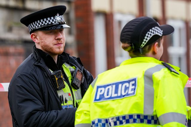 Police officers man a cordon on Cambridge Street, Derby, during a Major Explosives Incident in Derby that began on Thursday December 4 when police executed a warrant at an address on Vulcan Street, Derby, that saw two men arrested on suspicion of explosives offences and 200 homes evacuated (Maynard Manyowa / News Images)