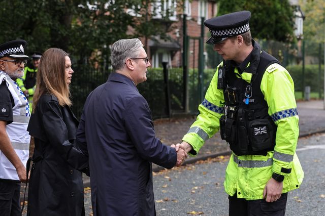 Sir Keir Starmer, Prime Minister of the United Kingdom of Great Britain and Northern Ireland shakes a police officers hand as he arrives at the scene during the Manchester synagogue terror attack day 2 at Heaton Park Shul, Manchester, United Kingdom, 3rd October 2025

(Photo by Mark Cosgrove/News Images)