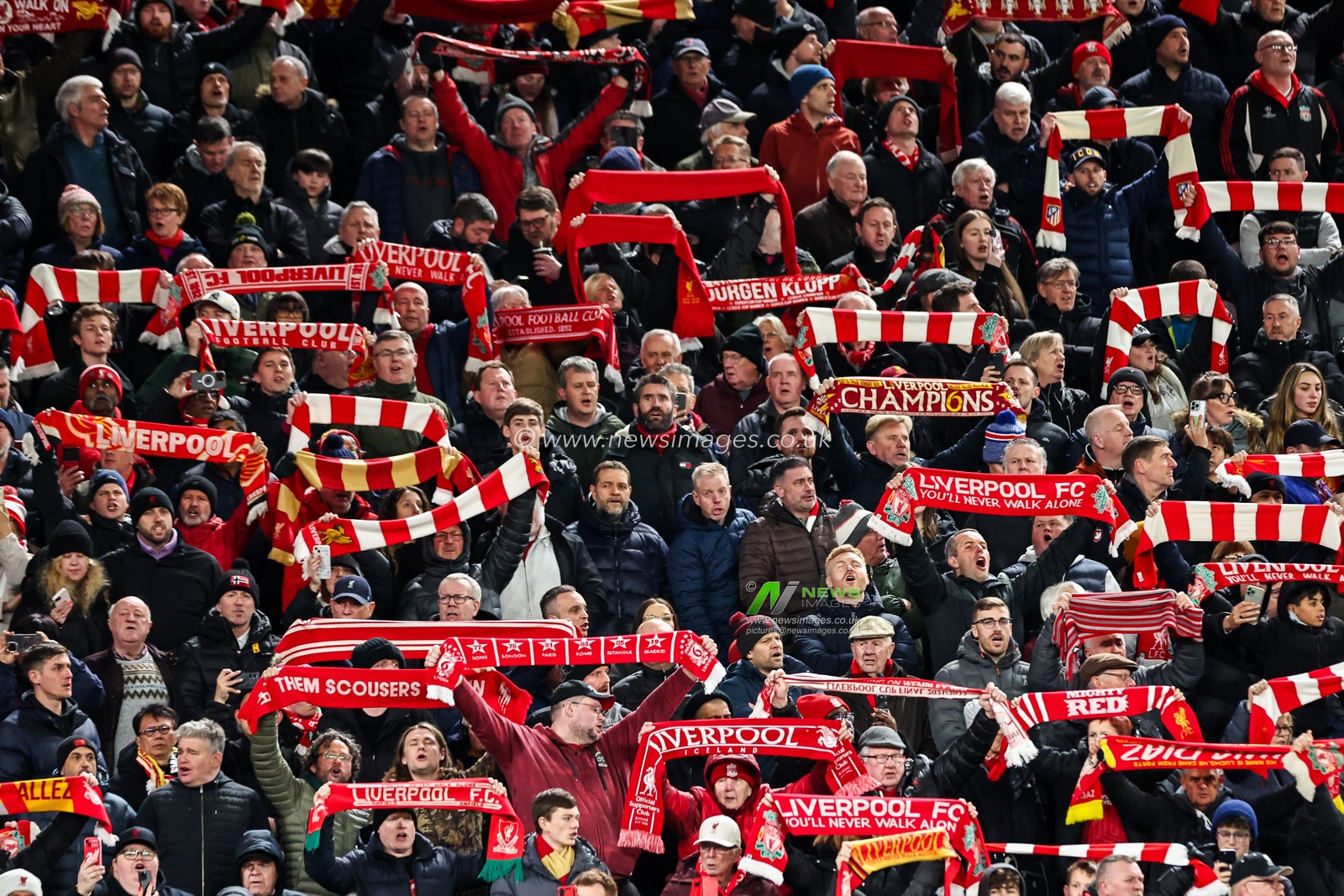Fans sign â€˜youâ€™ll never walk aloneâ€™ prior to the UEFA Champions League Last 16 match Liverpool vs Paris Saint-Germain at Anfield, Liverpool, United Kingdom, 11th March 2025

(Photo by Mark Cosgrove/News Images)