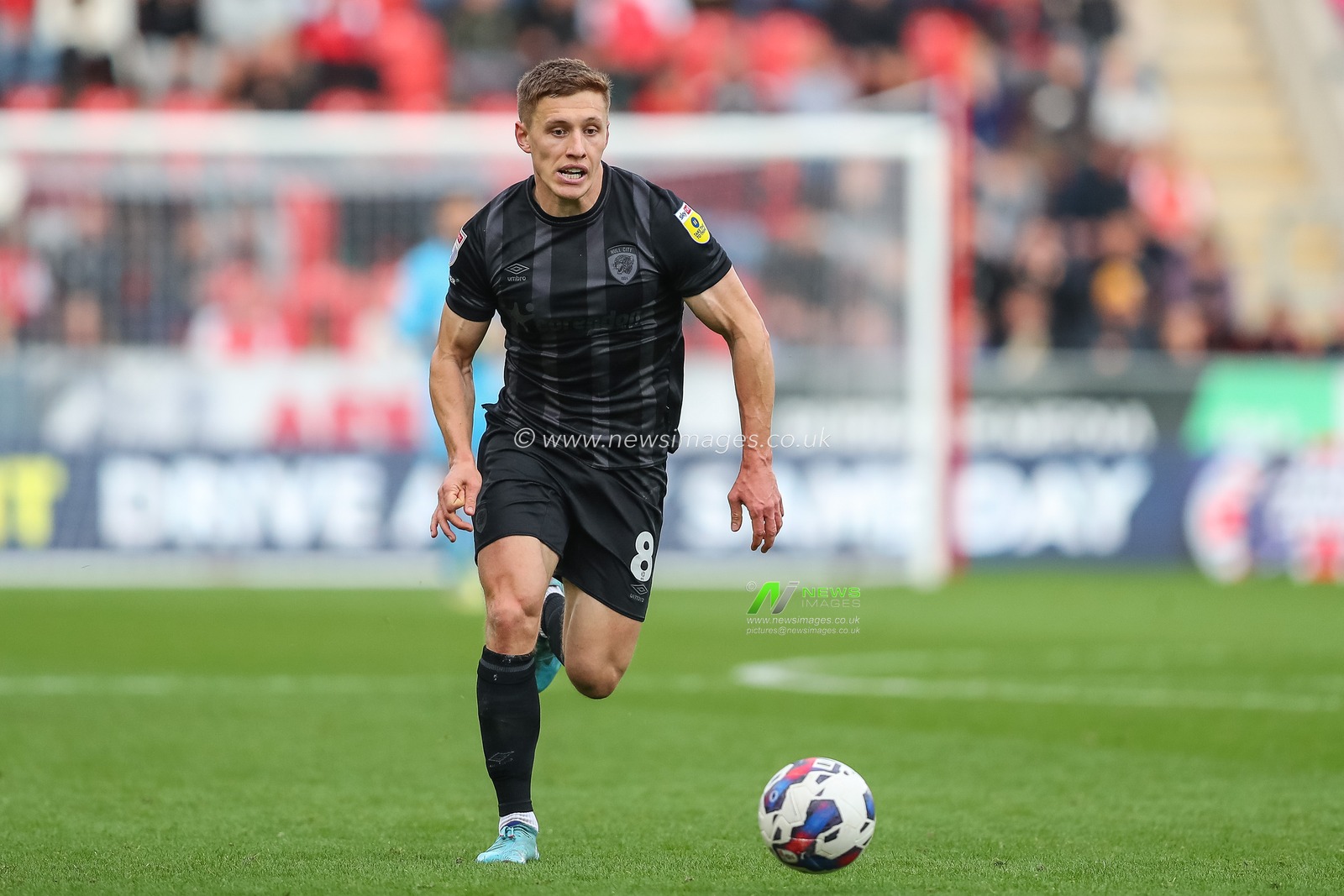 Greg Docherty #8 of Hull City runs with the ball during the Sky Bet Championship match Rotherham United vs Hull City at New York Stadium, Rotherham, United Kingdom, 22nd October 2022

(Photo by Gareth Evans/News Images)