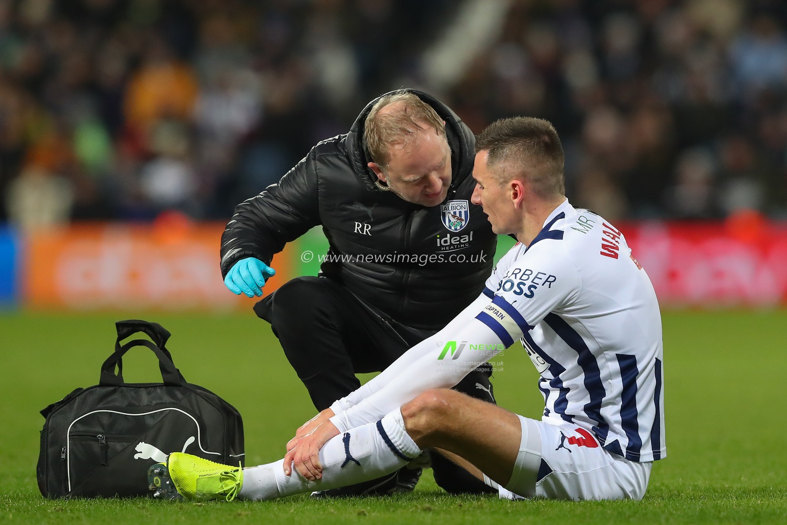 Jed Wallace #7 of West Bromwich Albion receives medical treatment during the Sky Bet Championship match West Bromwich Albion vs Leeds United at The Hawthorns, West Bromwich, United Kingdom, 29th December 2023

(Photo by Gareth Evans/News Images)