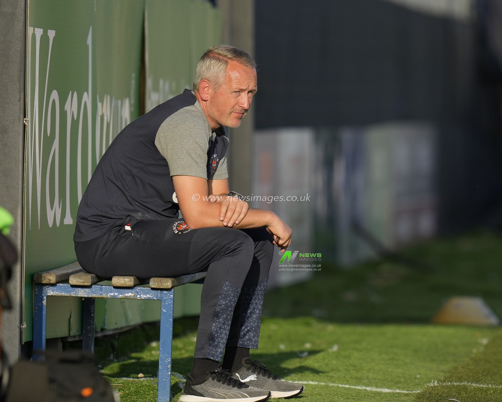 Neil Critchley, Manager of Blackpool watches his players warmup before the Papa John's Trophy match Barrow vs Blackpool at the SO Legal Stadium, Barrow-in-Furness, United Kingdom, 5th September 2023

(Photo by Steve Flynn/News Images)
