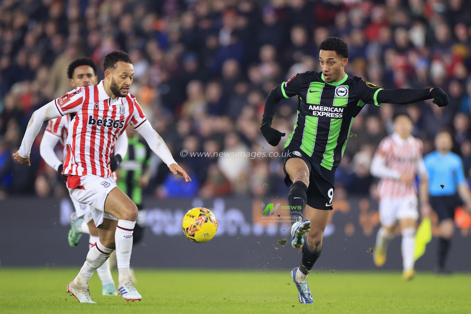 Joao Pedro of Brighton & Hove Albion passes the ball during the Emirates FA Cup Third Round match Stoke City vs Brighton and Hove Albion at Bet365 Stadium, Stoke-on-Trent, United Kingdom, 6th January 2024

(Photo by Conor Molloy/News Images)